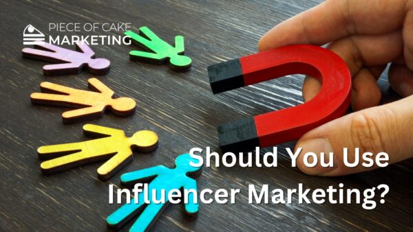 Should you consider influencer marketing. Image of a magnet attracting people.