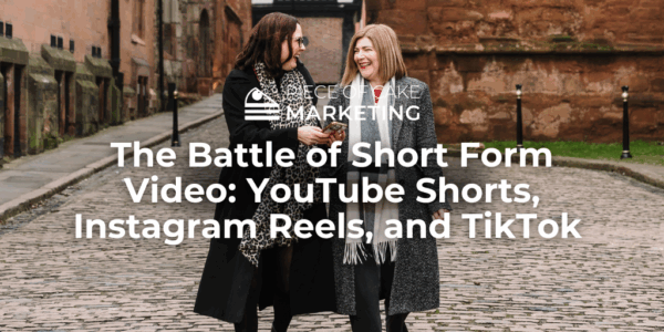 Image shows Kate and Emma on a Coventry Street near the Cathedral - laughing at each other